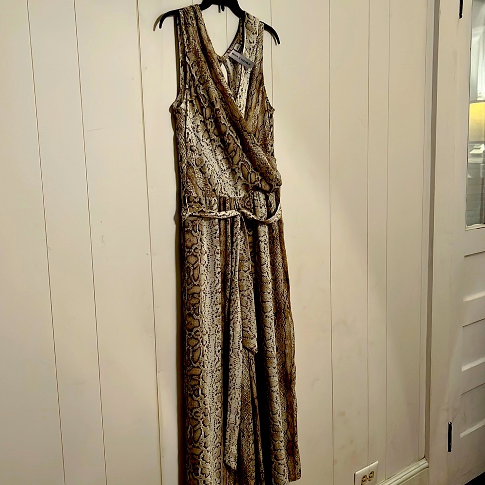 Leopard print jumpsuit size 8 inseam is 20”